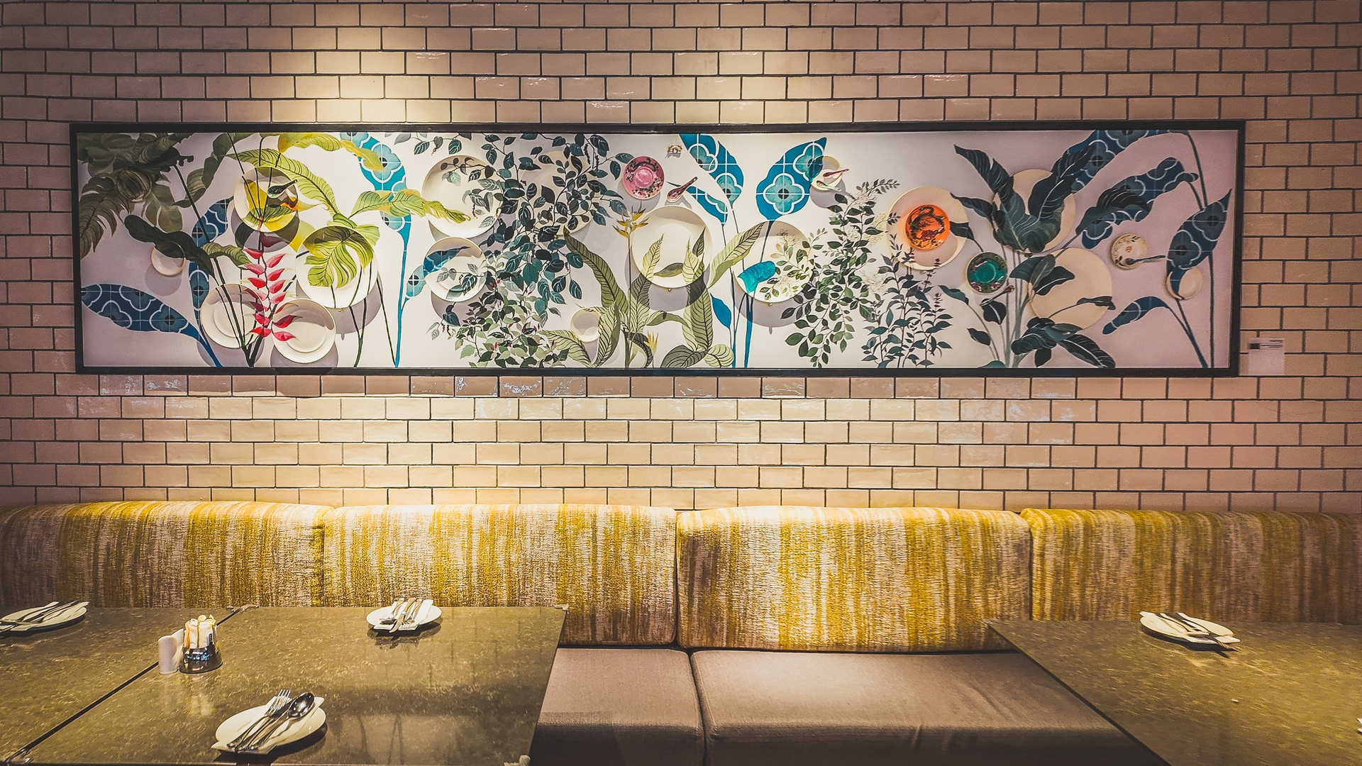 Curated artwork displayed in Amari Kuala Lumpur’s breakfast restaurant, creating a vibrant and cultural dining atmosphere.
