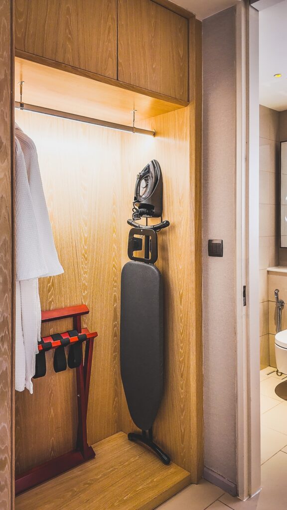 Luxurious his-and-hers walk-in wardrobe at Amari Kuala Lumpur, designed for effortless style and organization.