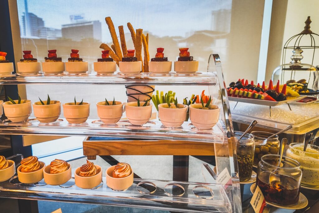 Elegant evening canapés served at Club TGA in Amari Kuala Lumpur, perfectly paired with cocktails and fine wines.